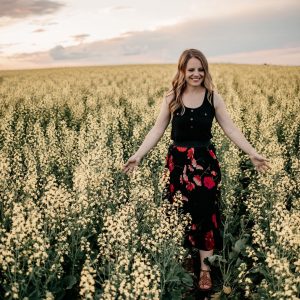 Lesley Kelly in a canola field